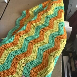 a vintage handmade crochet ripple or chevron pattern blanket 50"x72"